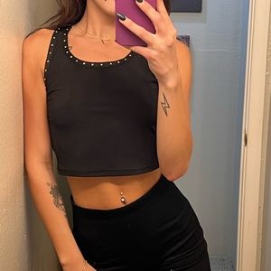 Black crop tank top with rose gold beaded design.
